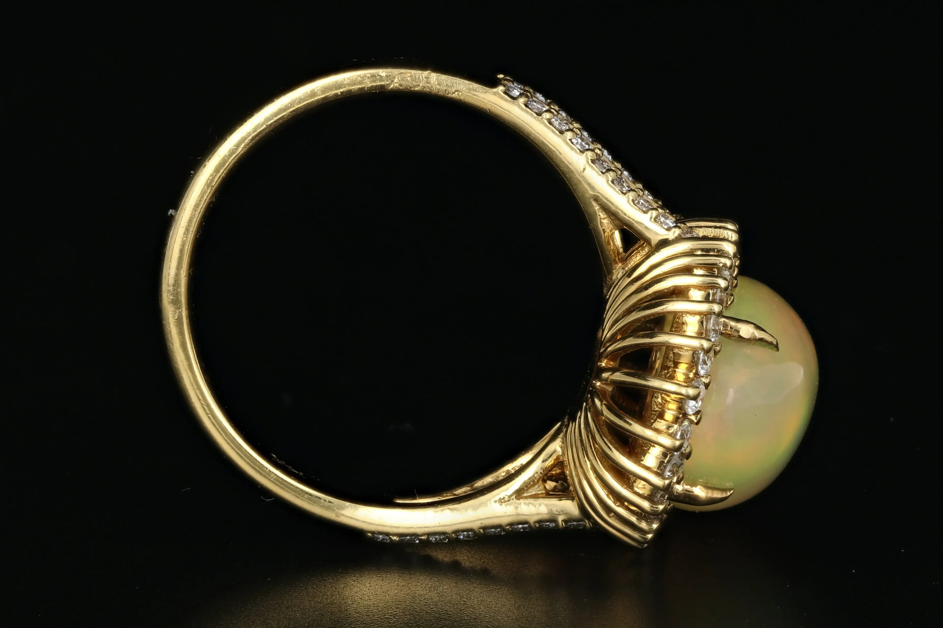 14K Yellow Gold 8.5 CT Ethiopian Opal with .75CTW Diamond Halo Ring