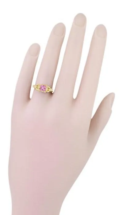 Art Deco Loving Hearts Antique Style Princess Cut Pink Sapphire Engraved Engagement Ring in 18 Karat Yellow Gold