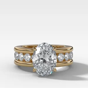 Chunky Channel Set Engagement Ring with Oval Cut Diamond