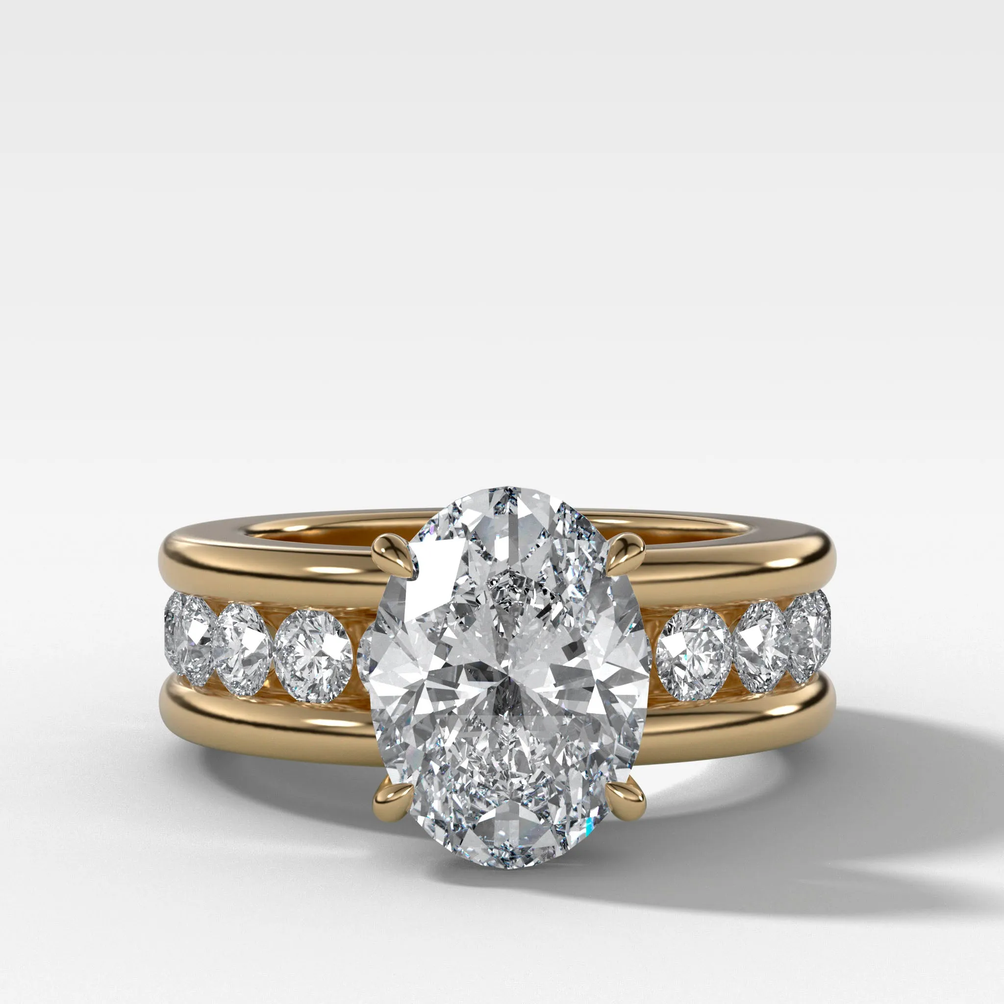 Chunky Channel Set Engagement Ring with Oval Cut Diamond
