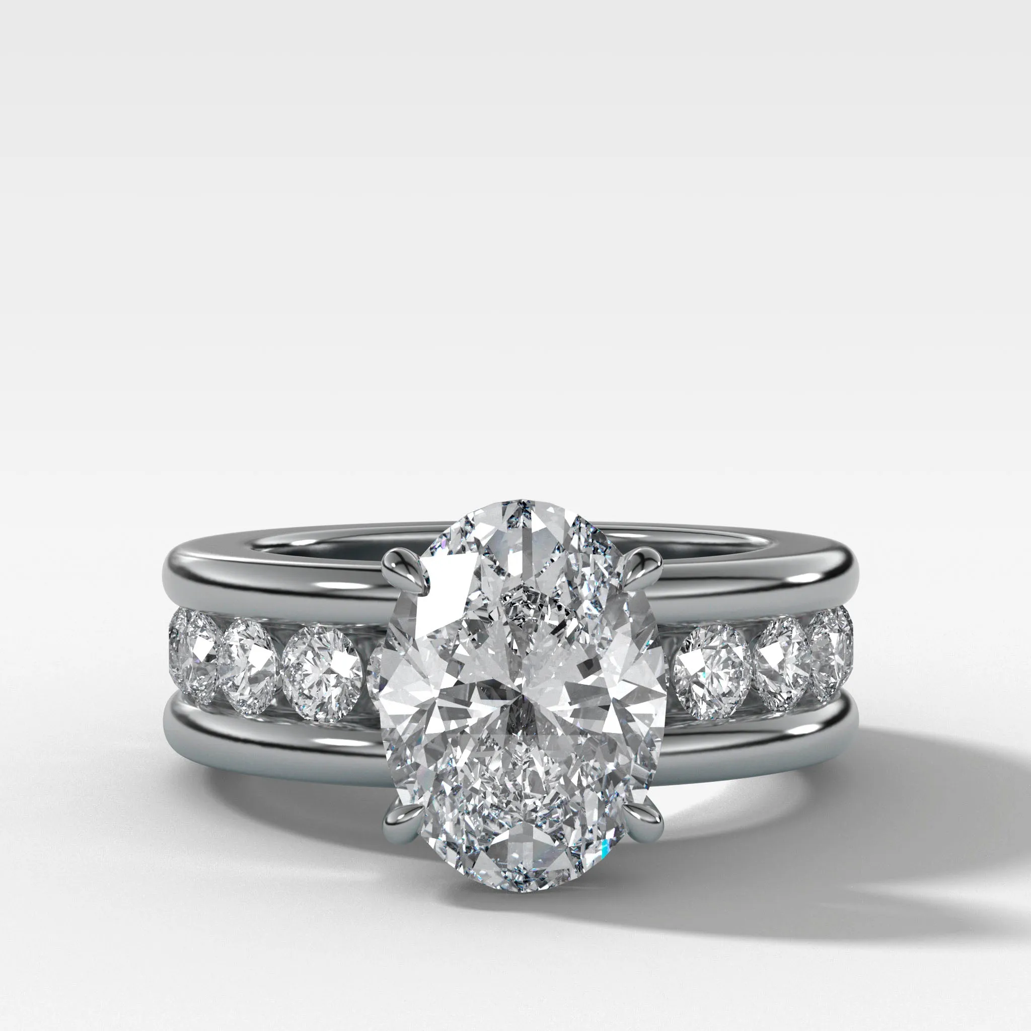 Chunky Channel Set Engagement Ring with Oval Cut Diamond