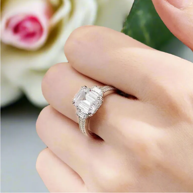 Classic Three Stone Emerald Cut Engagement Ring