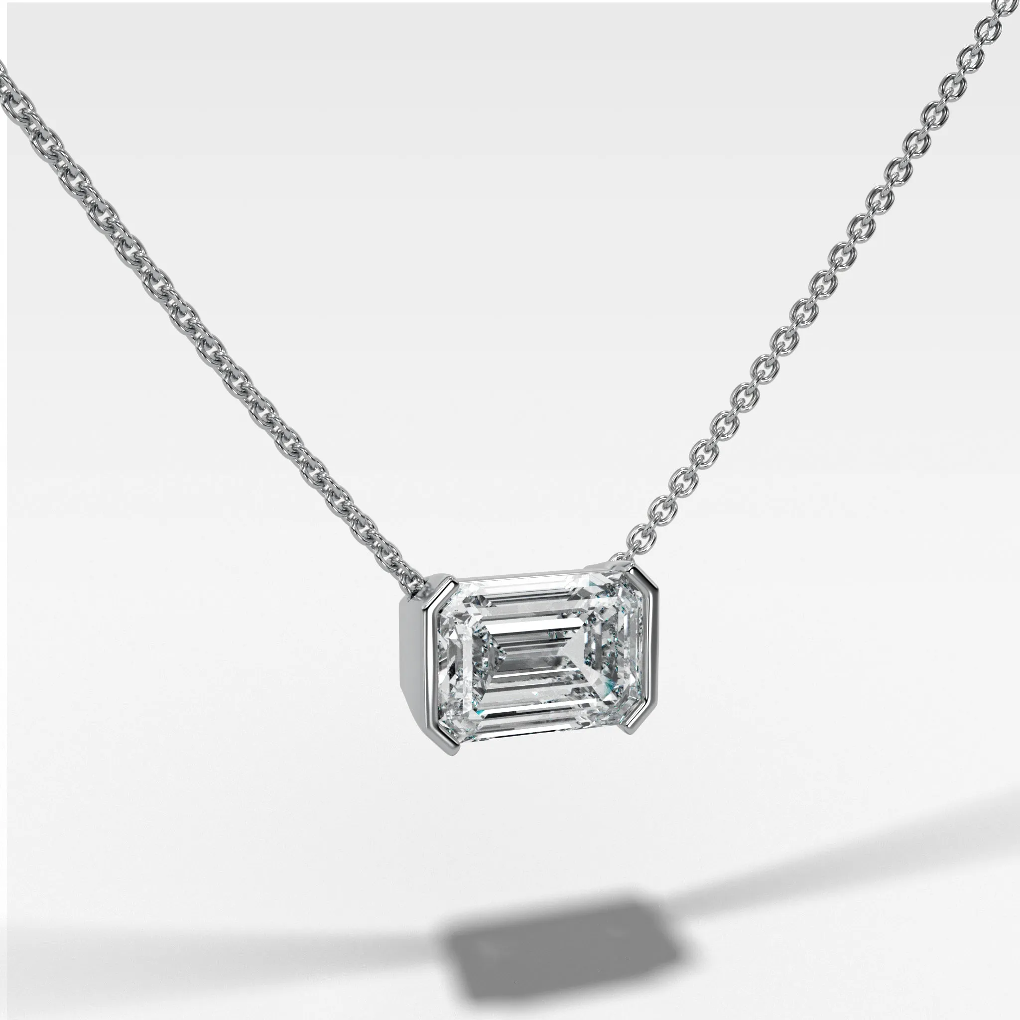 East West Half Bezel Pendant Necklace with Emerald Cut Diamond
