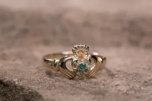 Ladies 14K Claddagh Ring set with Emerald and Diamonds