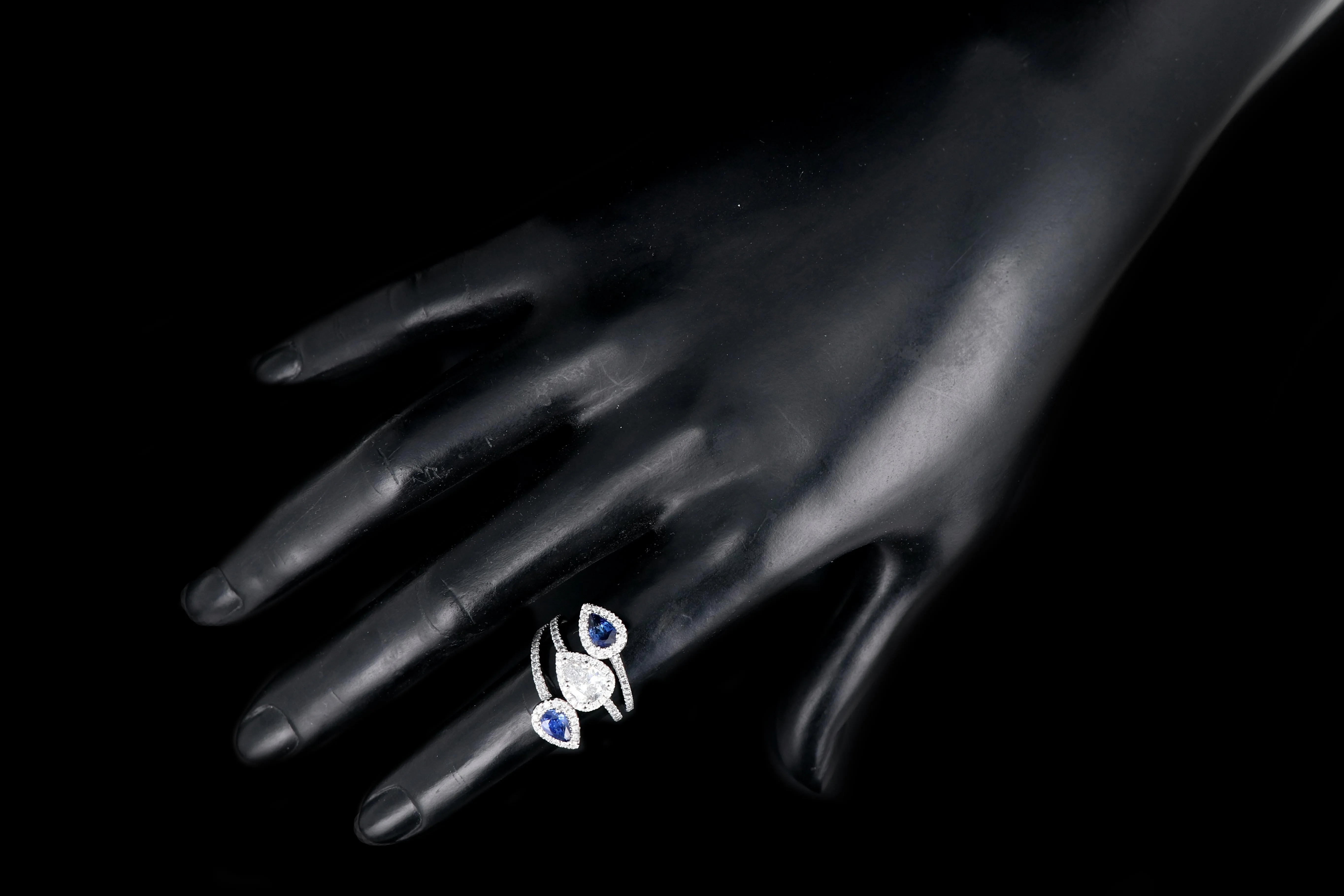 Modern 14K White Gold .83 CT Pear Cut Diamond And Sapphire Triple Bypass Ring GIA Certified