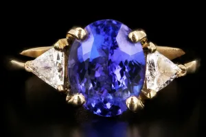 Modern 14K Yellow Gold 3 Carat Tanzanite and Trillion Cut Diamond Ring