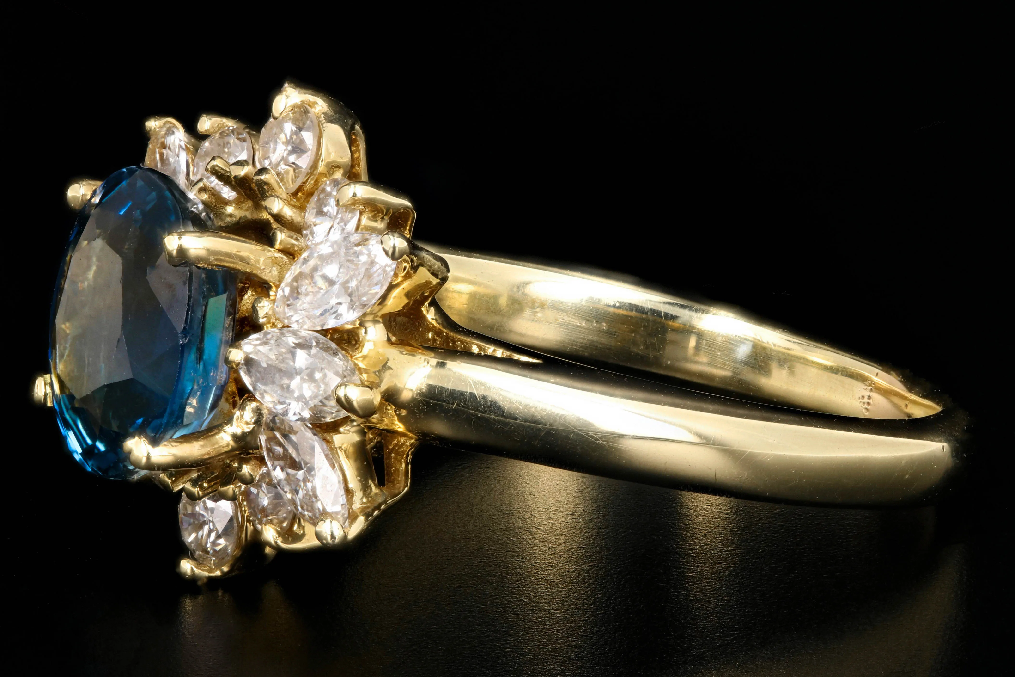 Modern 14K Yellow Gold GIA Certified 2.5 Carat Natural Sapphire and Diamond Halo Ring