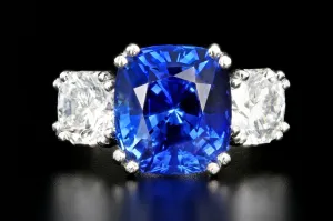 Modern Platinum 6.65 Carat Ceylon Sapphire and Octagonal Cut Diamond Three Stone Ring