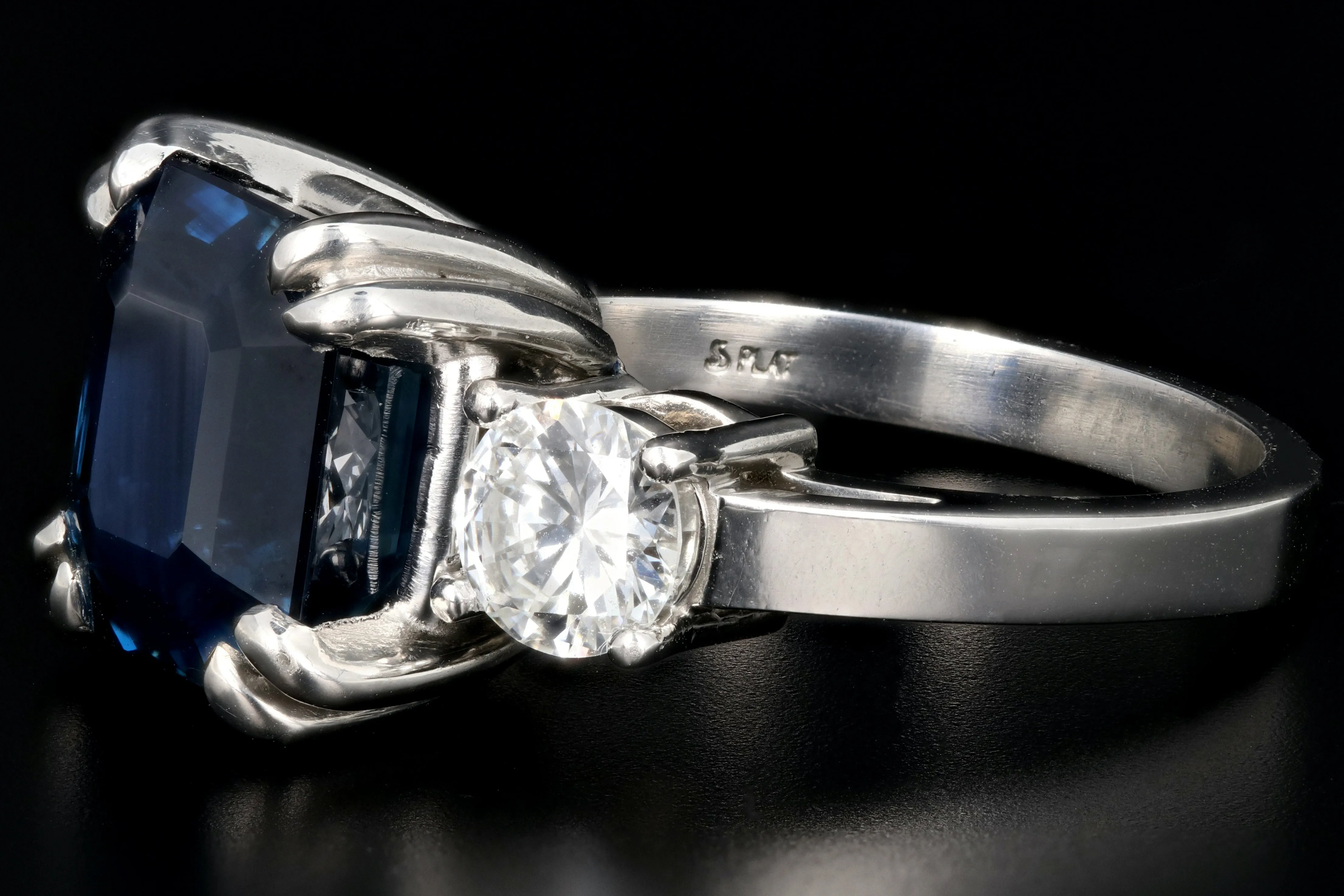 Modern Platinum AGL Certified 7.88 Carat Emerald Cut Sapphire and GIA Certified Diamond Ring
