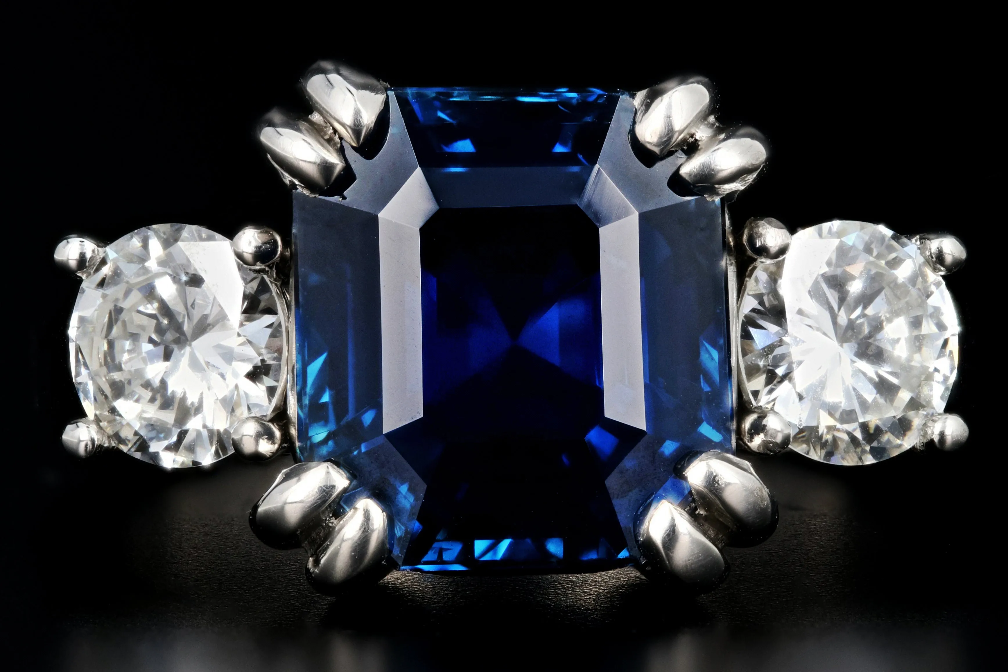 Modern Platinum AGL Certified 7.88 Carat Emerald Cut Sapphire and GIA Certified Diamond Ring