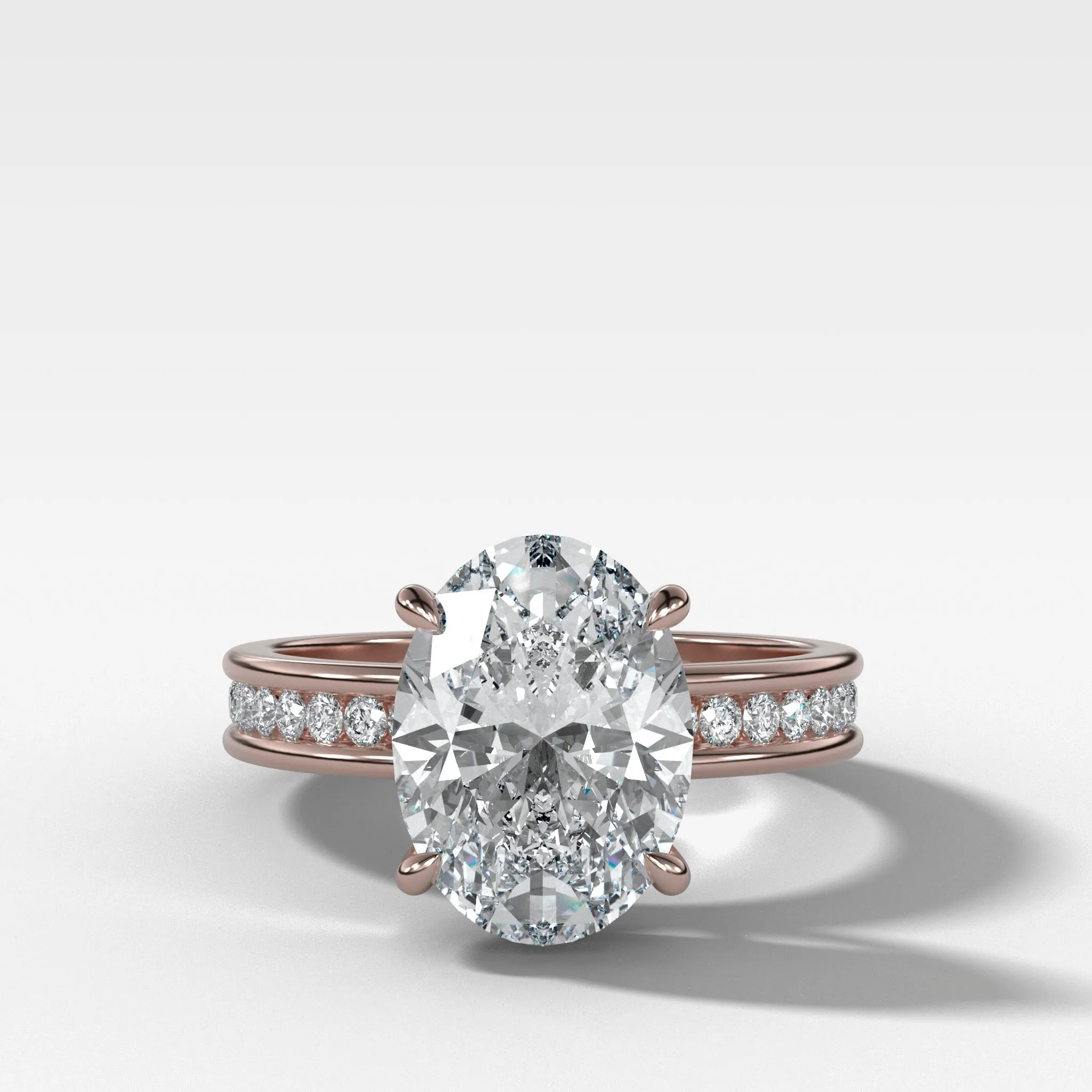 Petite Channel Set Engagement Ring with Oval Cut Diamond