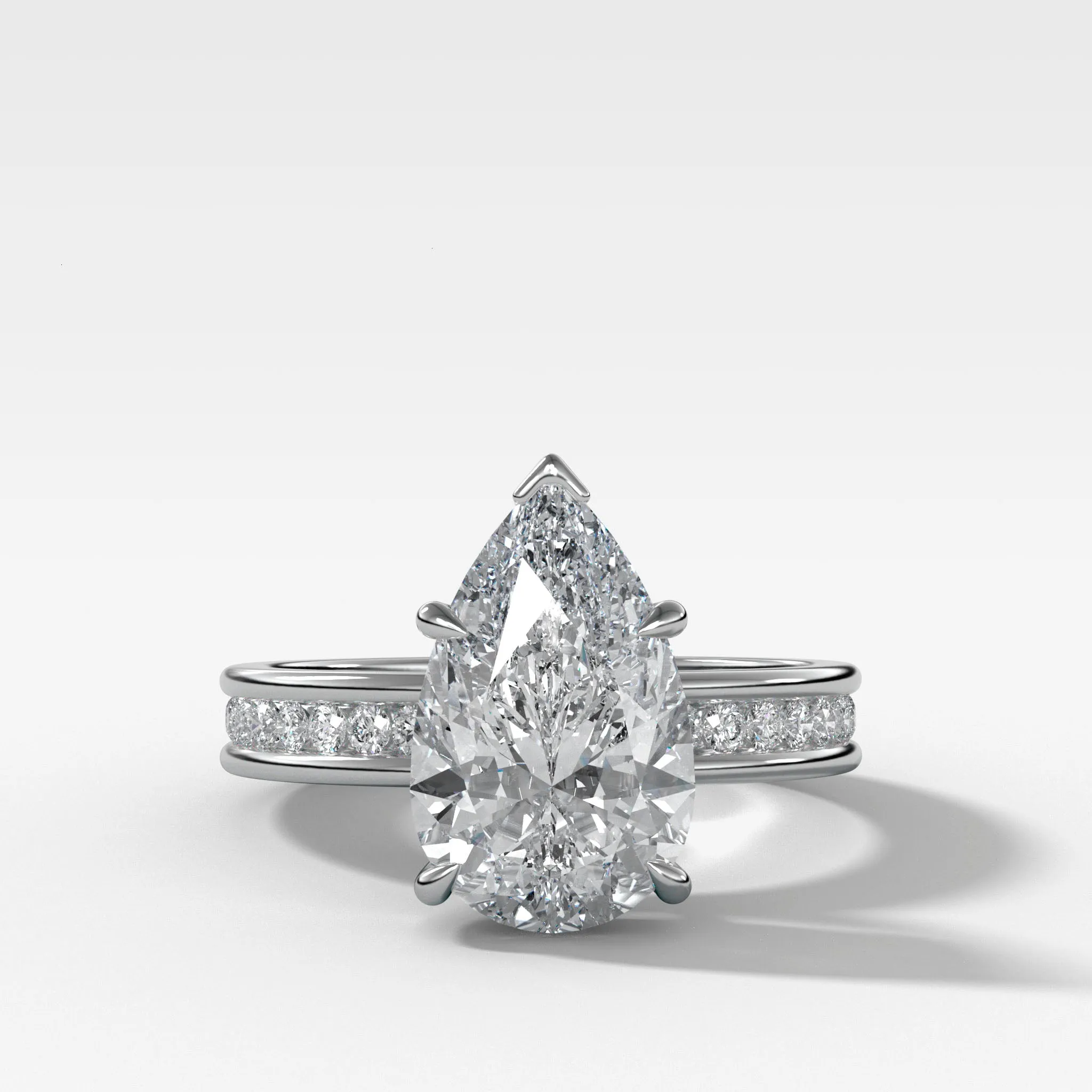 Petite Channel Set Engagement Ring with Pear Cut Diamond