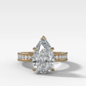 Petite Channel Set Engagement Ring with Pear Cut Diamond