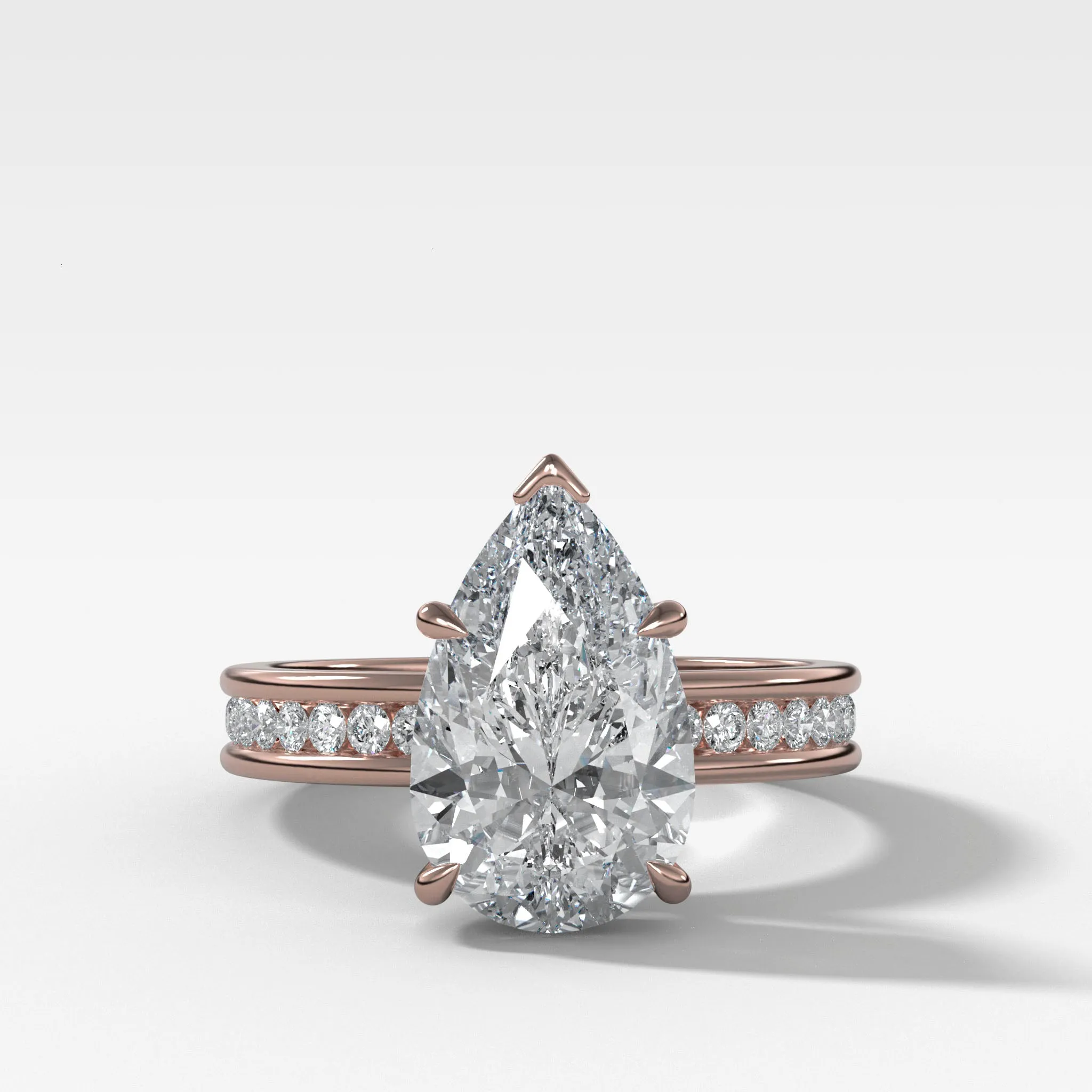 Petite Channel Set Engagement Ring with Pear Cut Diamond