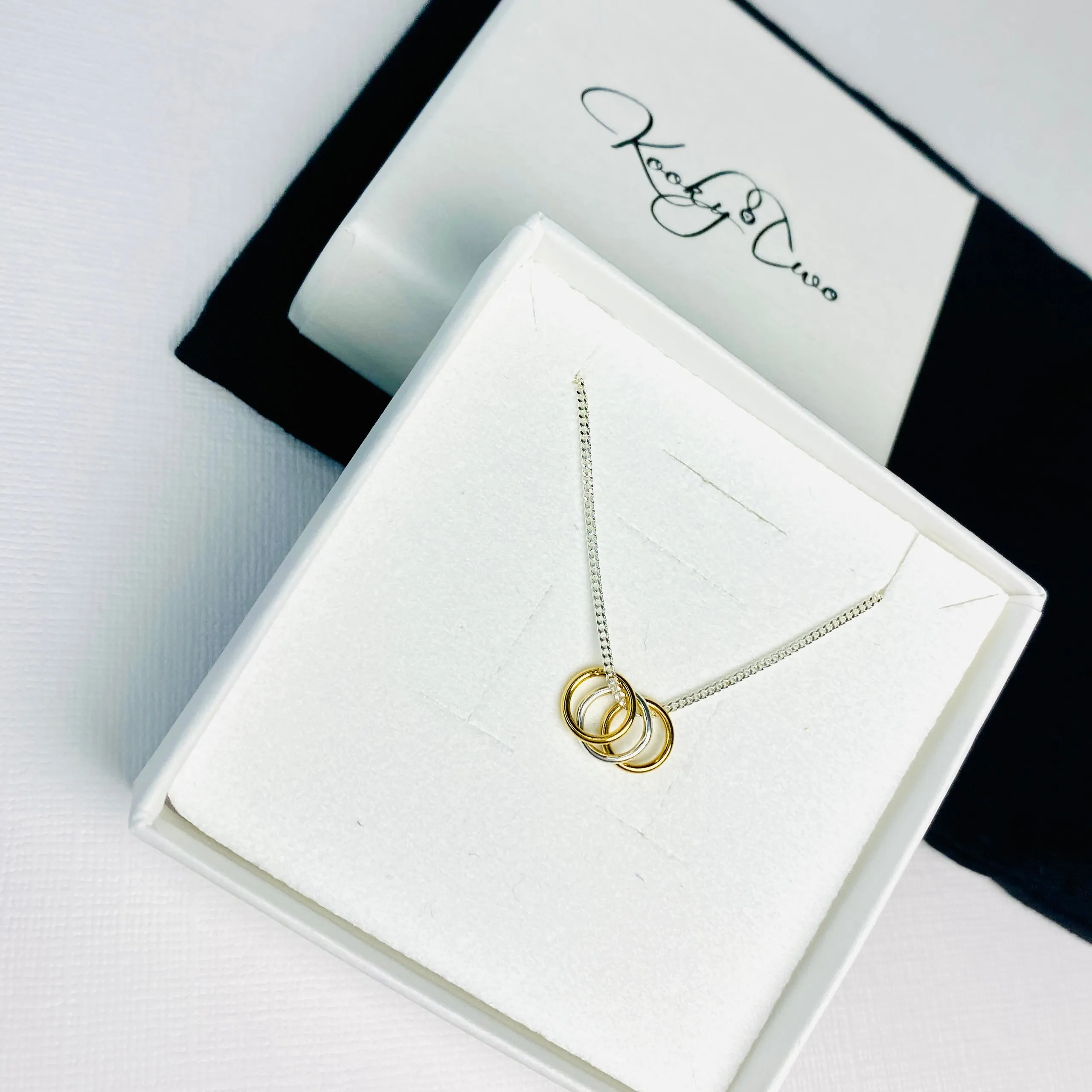 Silver Necklace with Silver and Gold Rings