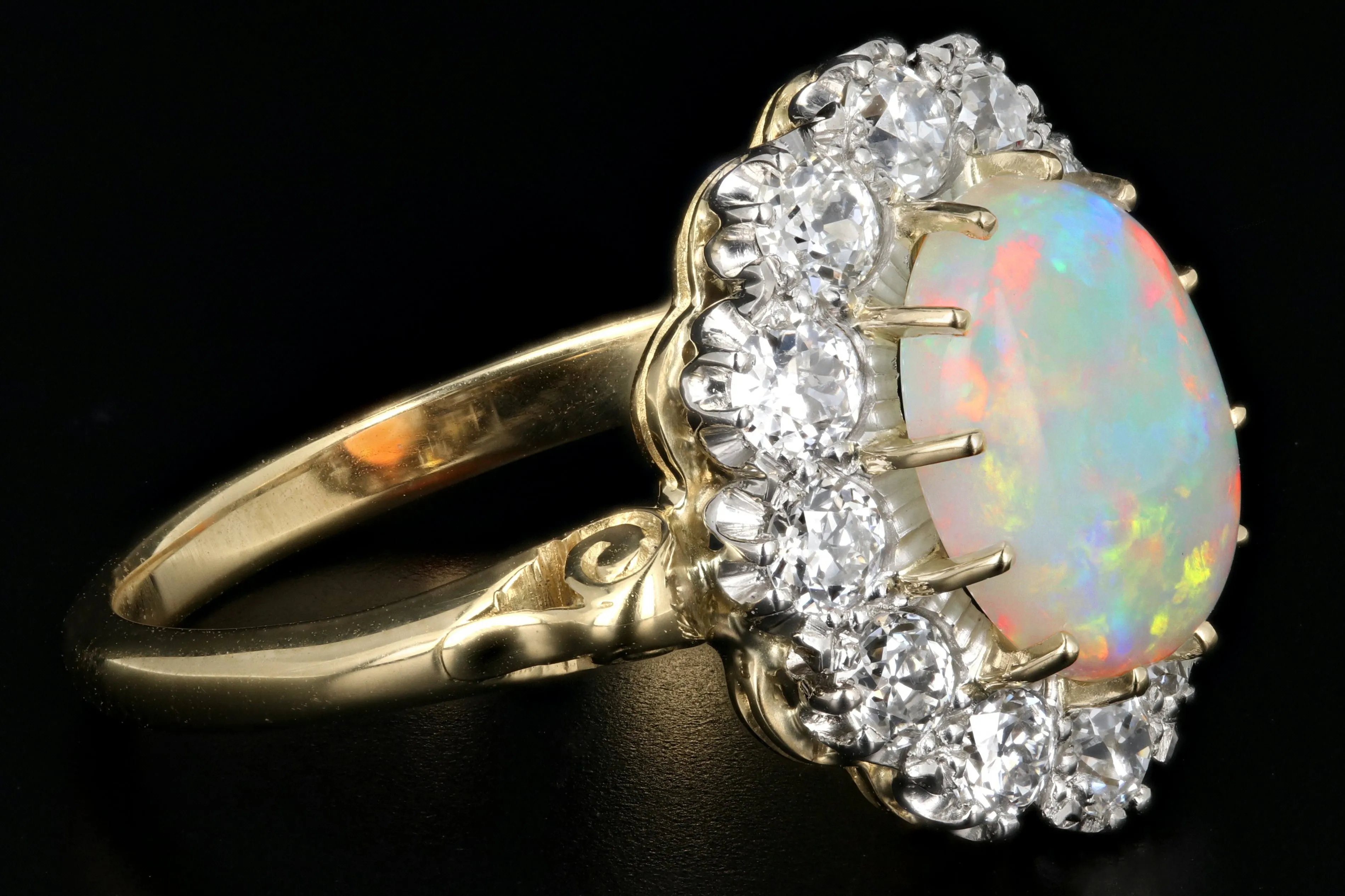 Victorian Style 18K Yellow Gold and Platinum 1.68 Carat Oval Cut Opal and Diamond Ring
